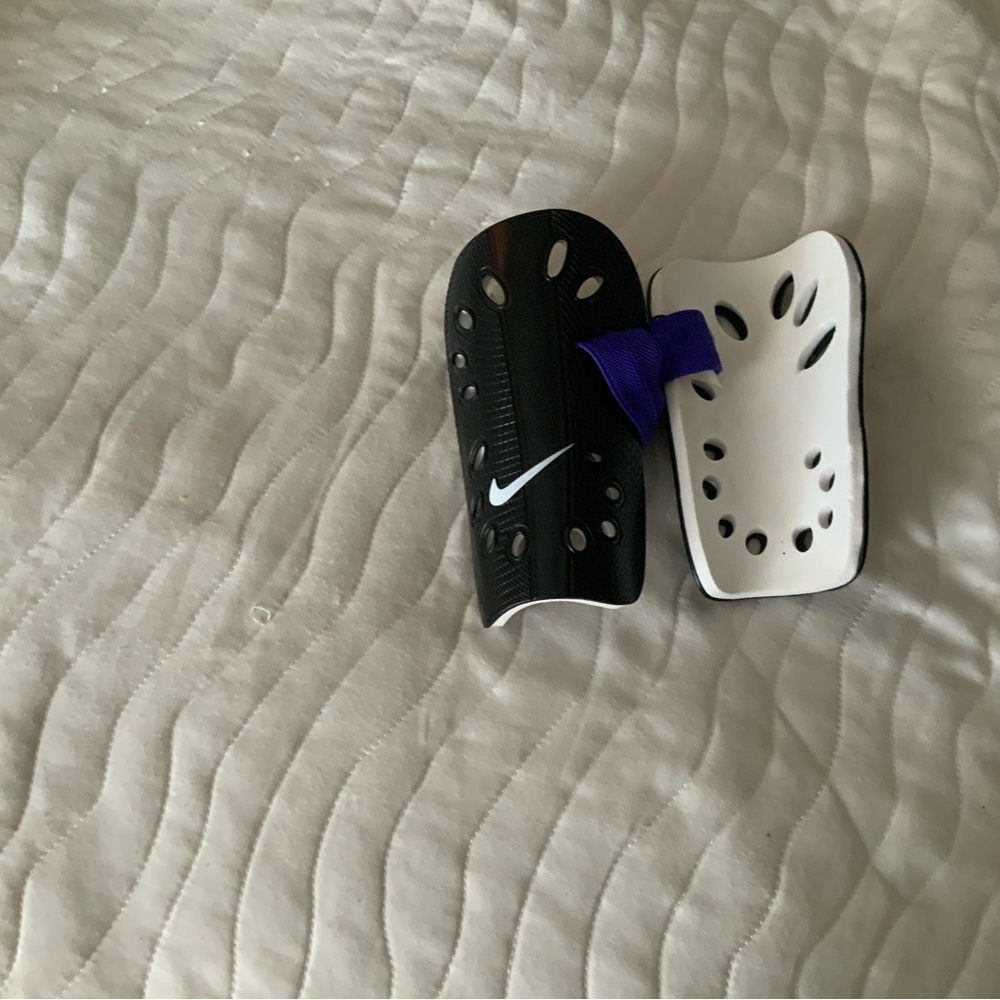 Nike Black and White Soccer Shin Guards with Purple Strap